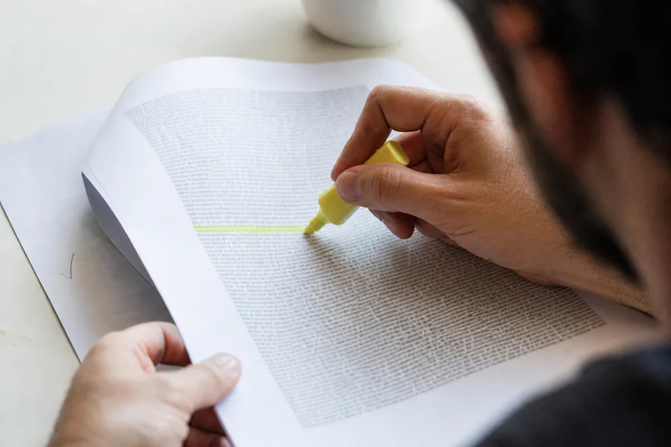 Highlighter on a line of printed text